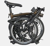 2023 Brompton C Line Explore Mid Handlebar 6 speed folding bike in Black Lacquer - folded