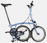 2023 Brompton C Line Explore Mid Handlebar 6 speed folding bike in Cloud Blue - kickstand mode