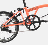 2023 Brompton C Line Explore Mid Handlebar 6 speed folding bike in Fire Coral - rear derailleur
