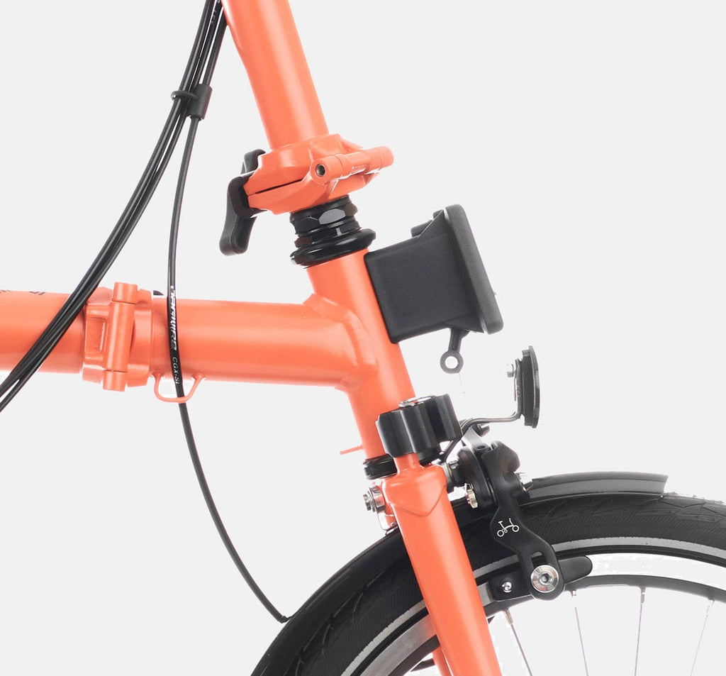 2023 Brompton C Line Explore Mid Handlebar 6 speed folding bike in Fire Coral - Front Carrier Block