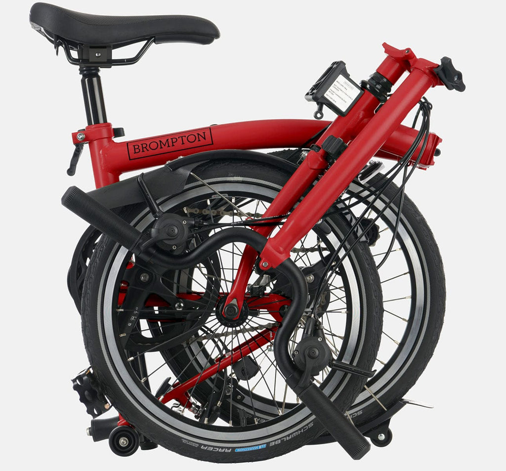 2023 Brompton C Line Explore High Handlebar 6-speed folding bike in House Red - folded