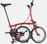 2023 Brompton C Line Explore Mid Handlebar 6 speed folding bike in House Red - kickstand mode