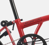 2023 Brompton C Line Explore Mid Handlebar 6 speed folding bike in House Red - steel frame