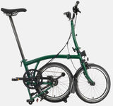 2023 Brompton C Line Explore Mid Handlebar 6 speed folding bike in Racing Green - kickstand mode